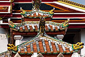 Bangkok Wat Pho, detail of multicolored mosaic made from chips of Chinese ceramic bowls. 